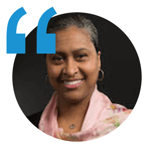 headshot of pamela talley, an itential network automation employee, with a blue quotation mark on the top left corner