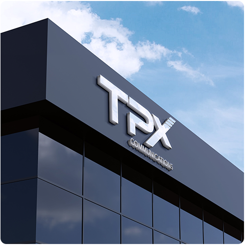 square photo of an office building with the tpx communications logo on it representing an itential case study on sdwan automation